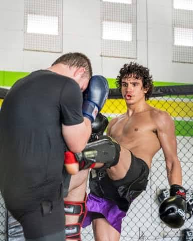 Joseph flying knee on pads