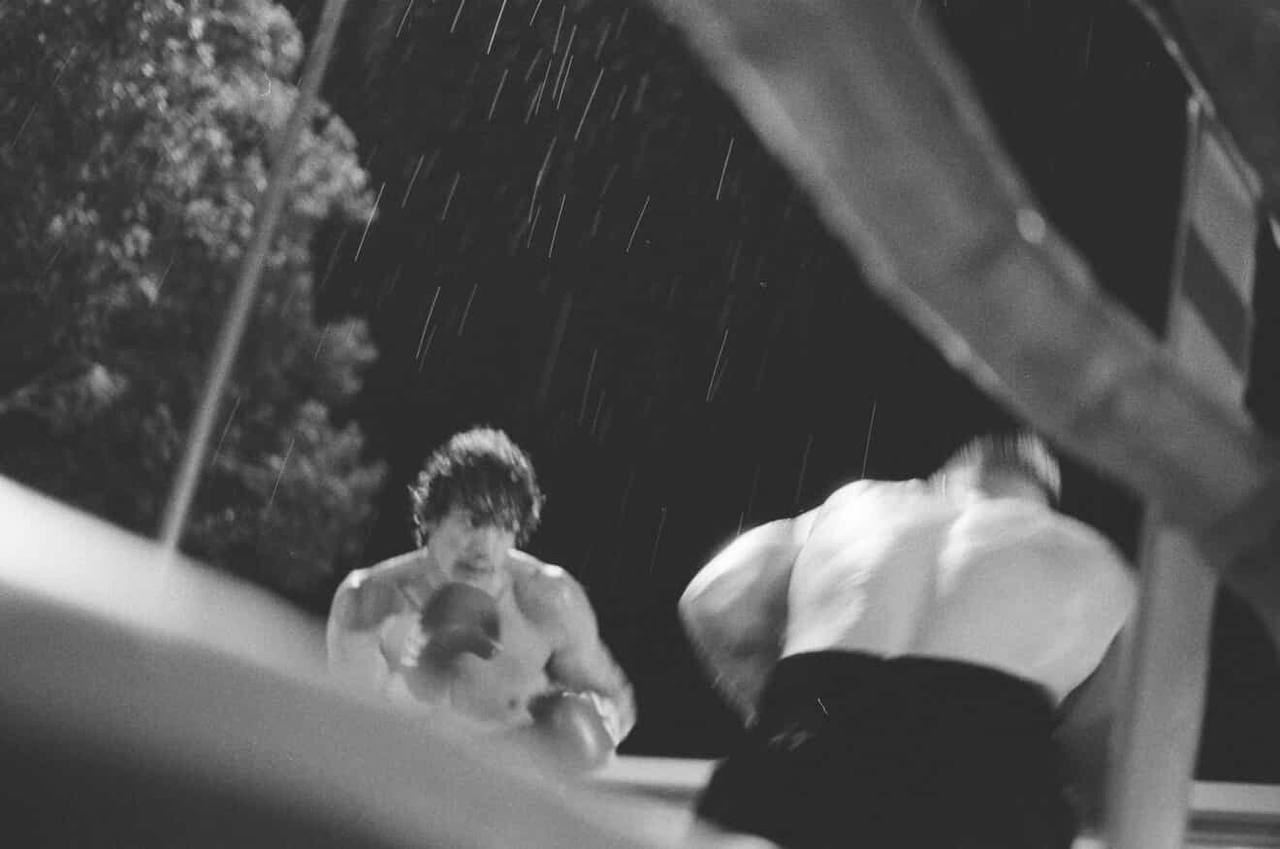 Joseph fighting in the rain