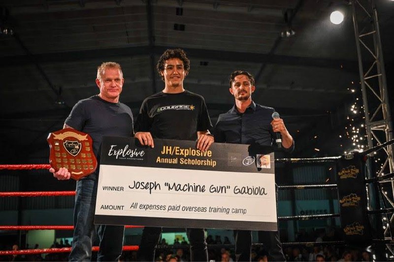 Joseph receiving JH Explosive Scholarship