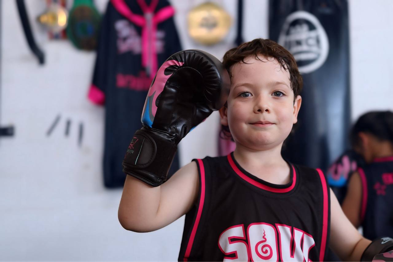 Boy raising glove