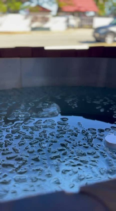 Close-up of ice bath water with bubbles