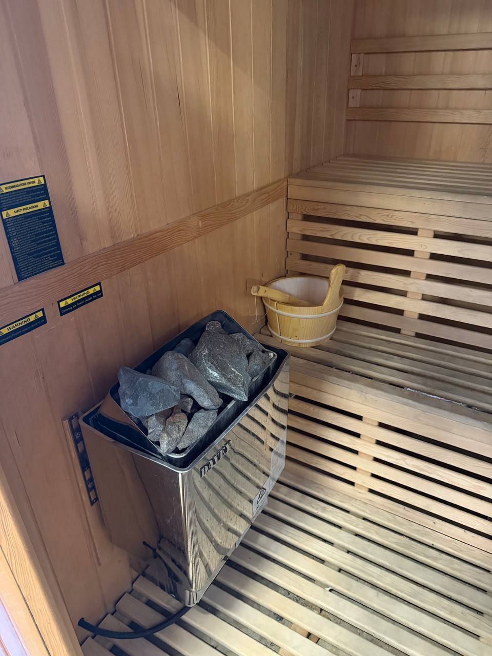 Wide view of the spacious sauna interior